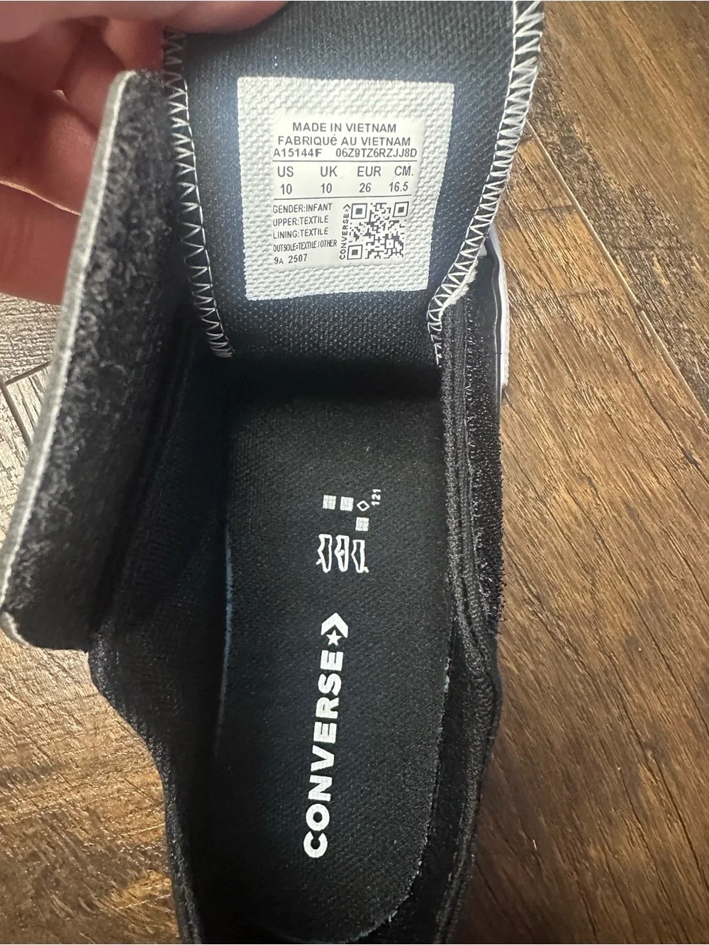 Converse Kids Black Penguin Slip-On Sneakers with Blue Eyes and Orange Beak